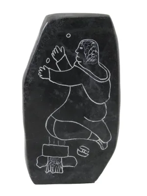 Inuit fishing soapstone carving by Artist Moses Ainalik