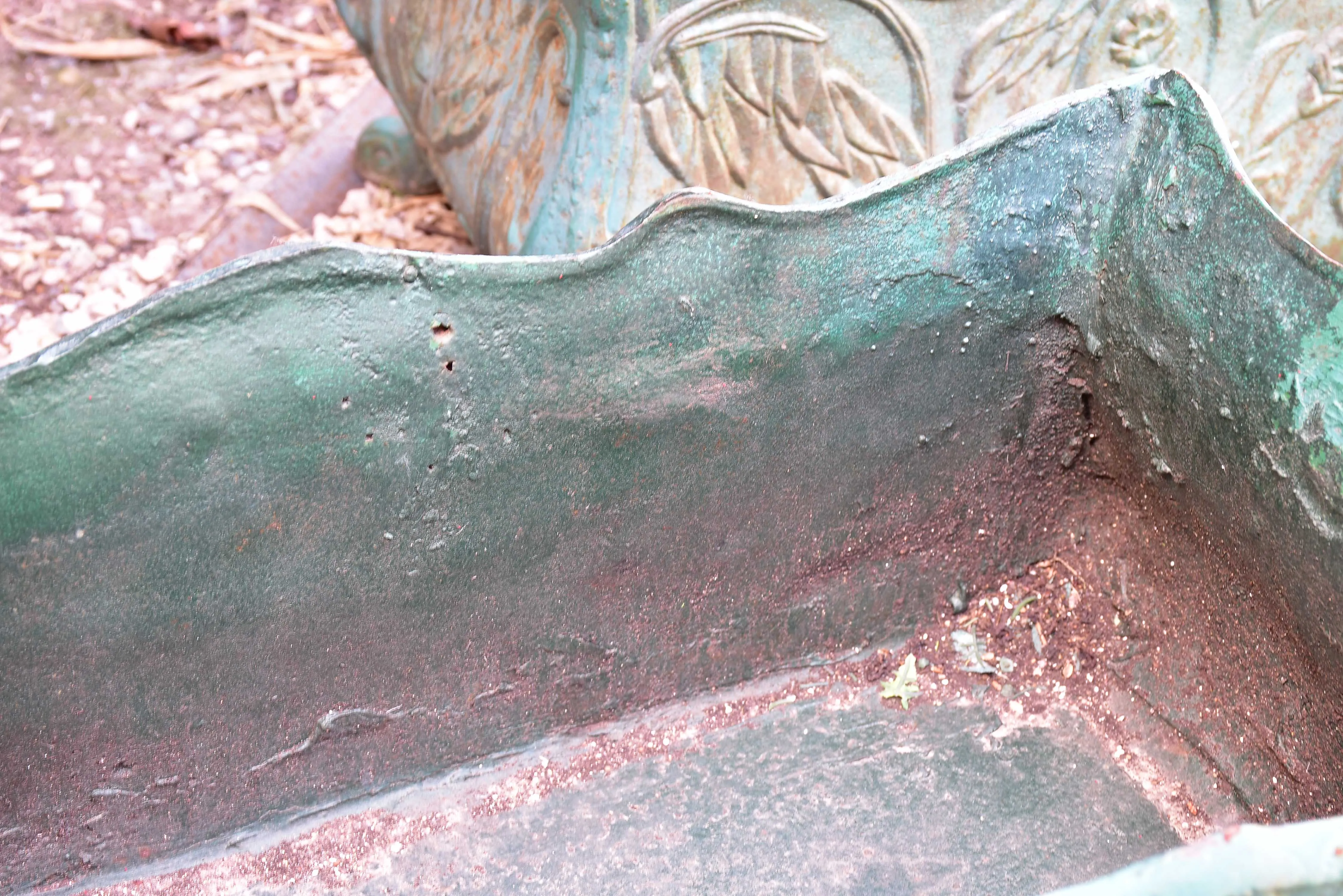 Two antique cast iron French garden planters with green finish