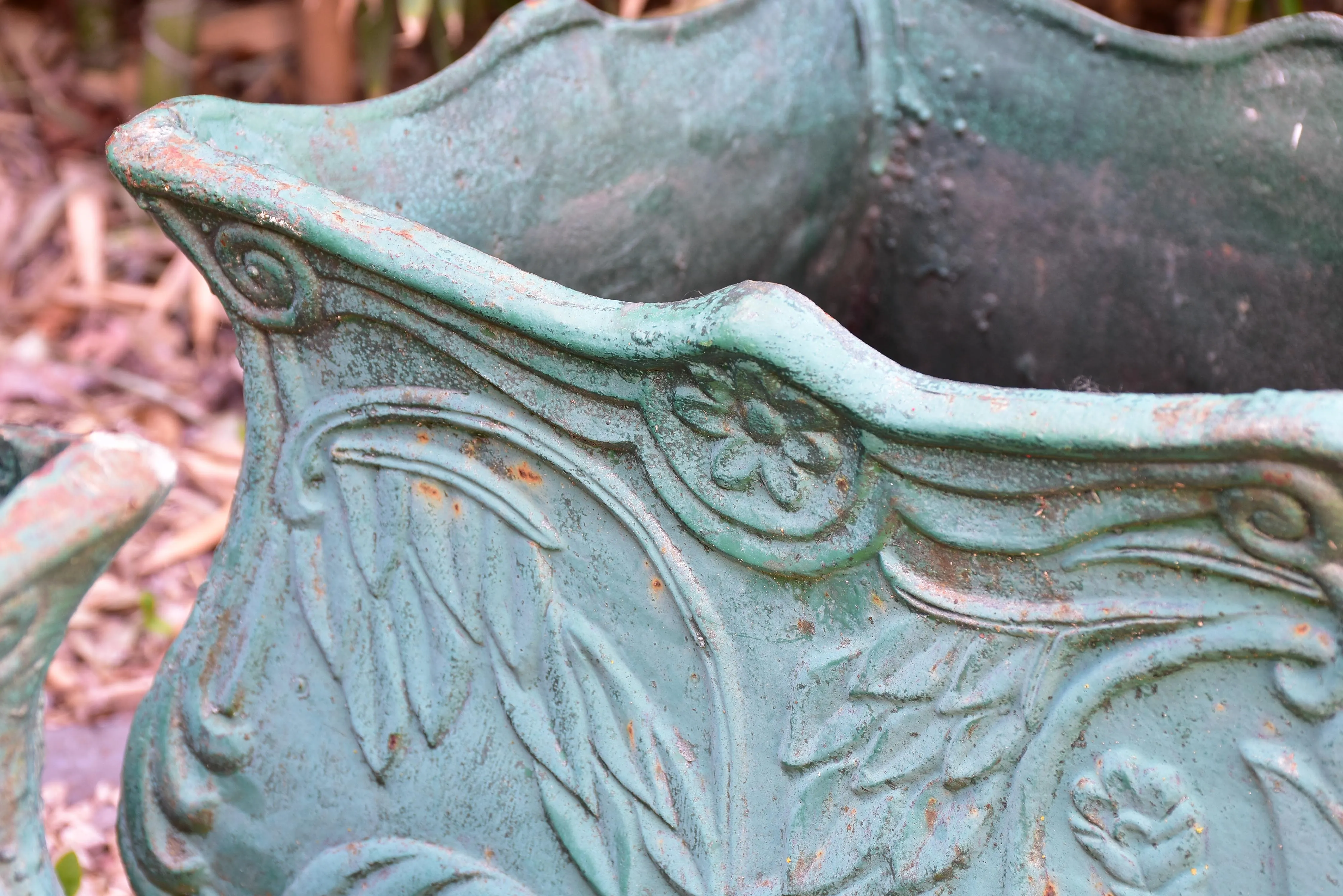 Two antique cast iron French garden planters with green finish
