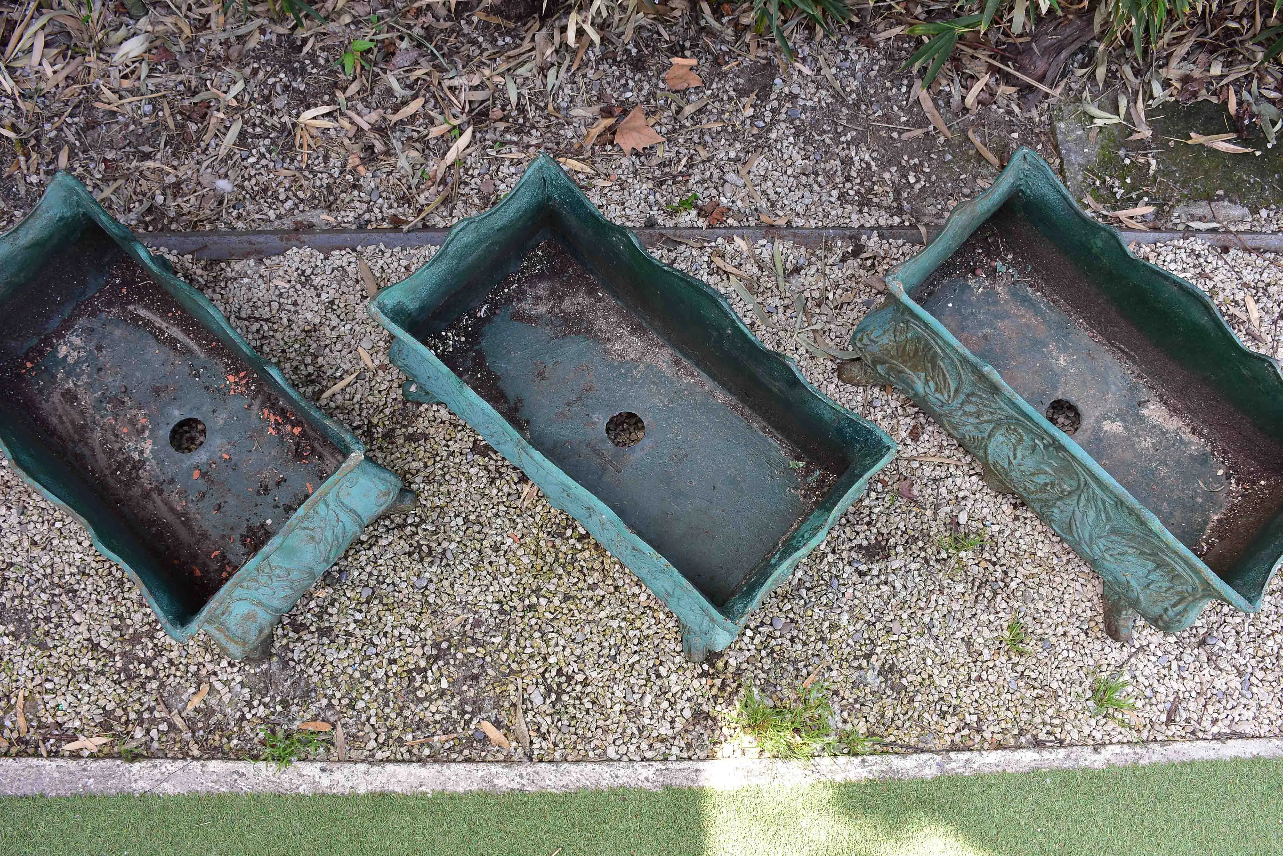 Two antique cast iron French garden planters with green finish